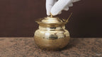 Brass ghee pot with lid and spoon for daily kitchen use