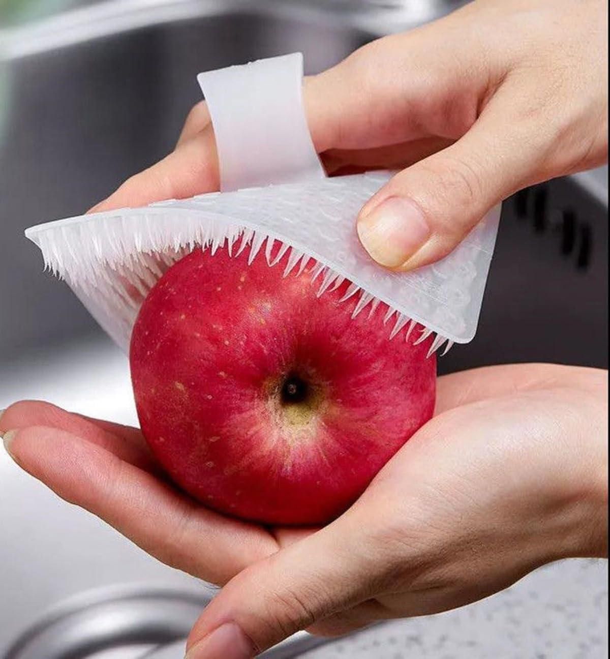 Silicone pad gently removes dirt from apples
